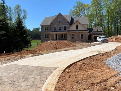 EXCITING NEW ESTATE HOME ON 0.89AC by Stonecrest Homes is under on Woodmont Golf and Country Club in Georgia - for sale on GolfHomes.com, golf home, golf lot
