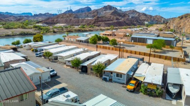 On leased land - Discover the ultimate river lifestyle! This on Emerald Canyon Golf Course in Arizona - for sale on GolfHomes.com, golf home, golf lot
