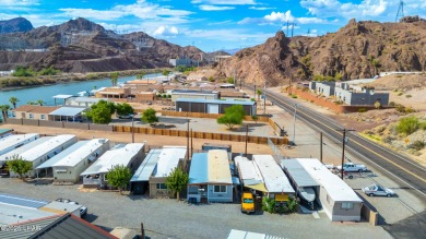 On leased land - Discover the ultimate river lifestyle! This on Emerald Canyon Golf Course in Arizona - for sale on GolfHomes.com, golf home, golf lot