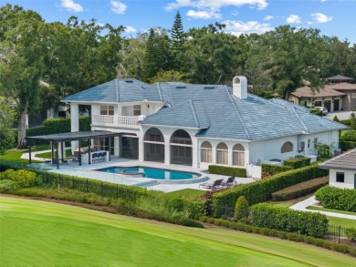Stunning golf and lake views and beautifully updated grounds are on Isleworth Golf and Country Club in Florida - for sale on GolfHomes.com, golf home, golf lot