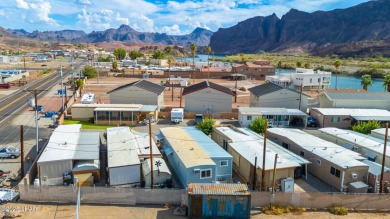 On leased land - Discover the ultimate river lifestyle! This on Emerald Canyon Golf Course in Arizona - for sale on GolfHomes.com, golf home, golf lot