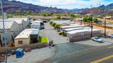 On leased land - Discover the ultimate river lifestyle! This on Emerald Canyon Golf Course in Arizona - for sale on GolfHomes.com, golf home, golf lot