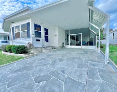 This well-maintained home, positioned above others of its era in on Fairway Village Golf Course in Florida - for sale on GolfHomes.com, golf home, golf lot