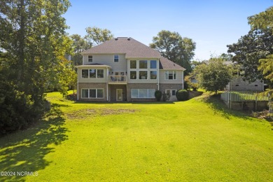 Beautiful home with stunning views must be seen to appreciate on Oyster Bay Golf Links in North Carolina - for sale on GolfHomes.com, golf home, golf lot