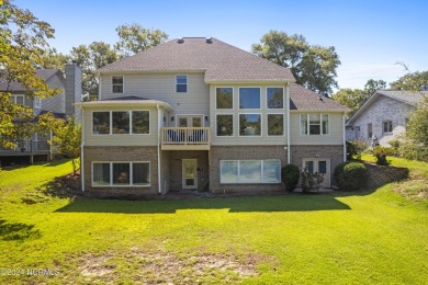 Beautiful home with stunning views must be seen to appreciate on Oyster Bay Golf Links in North Carolina - for sale on GolfHomes.com, golf home, golf lot