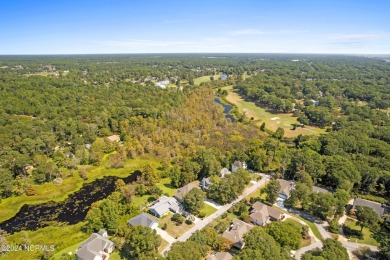 Beautiful home with stunning views must be seen to appreciate on Oyster Bay Golf Links in North Carolina - for sale on GolfHomes.com, golf home, golf lot