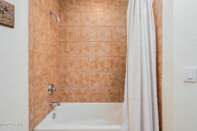 OCEANS GRAND CONDOMINIUM - Contemporary Coastal Elegance on Oceans Golf Club in Florida - for sale on GolfHomes.com, golf home, golf lot