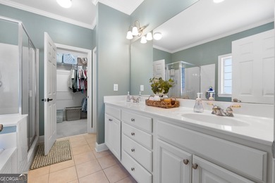 Welcome to this charming 3-bedroom, 2-bath home offering 2,403 on Summergrove Golf Club in Georgia - for sale on GolfHomes.com, golf home, golf lot