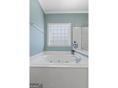 Welcome to this charming 3-bedroom, 2-bath home offering 2,403 on Summergrove Golf Club in Georgia - for sale on GolfHomes.com, golf home, golf lot