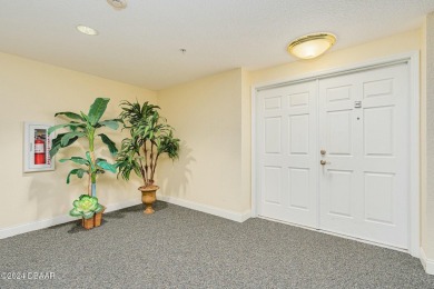 OCEANS GRAND CONDOMINIUM - Contemporary Coastal Elegance on Oceans Golf Club in Florida - for sale on GolfHomes.com, golf home, golf lot