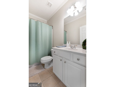 Welcome to this charming 3-bedroom, 2-bath home offering 2,403 on Summergrove Golf Club in Georgia - for sale on GolfHomes.com, golf home, golf lot