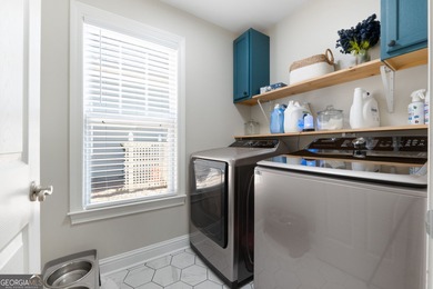 Welcome to this charming 3-bedroom, 2-bath home offering 2,403 on Summergrove Golf Club in Georgia - for sale on GolfHomes.com, golf home, golf lot