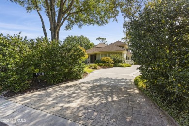 Welcome to this luxurious, Frank Lloyd Wright-inspired home in on Country Club of Landfall in North Carolina - for sale on GolfHomes.com, golf home, golf lot