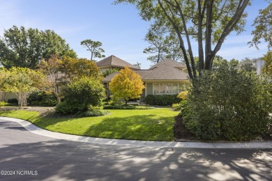 Welcome to this luxurious, Frank Lloyd Wright-inspired home in on Country Club of Landfall in North Carolina - for sale on GolfHomes.com, golf home, golf lot