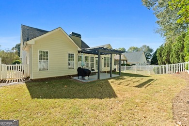 Welcome to this charming 3-bedroom, 2-bath home offering 2,403 on Summergrove Golf Club in Georgia - for sale on GolfHomes.com, golf home, golf lot
