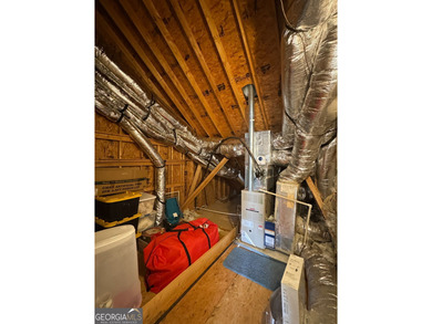 Welcome to this charming 3-bedroom, 2-bath home offering 2,403 on Summergrove Golf Club in Georgia - for sale on GolfHomes.com, golf home, golf lot