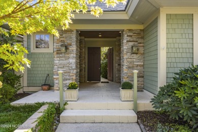 Welcome to this luxurious, Frank Lloyd Wright-inspired home in on Country Club of Landfall in North Carolina - for sale on GolfHomes.com, golf home, golf lot