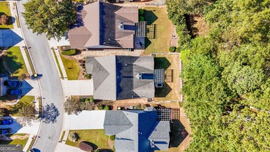 Welcome to this charming 3-bedroom, 2-bath home offering 2,403 on Summergrove Golf Club in Georgia - for sale on GolfHomes.com, golf home, golf lot