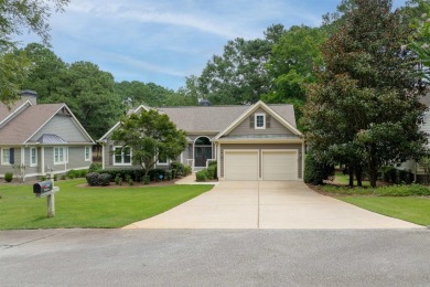 Enjoy effortless, single-level living in this thoughtfully on Great Waters Course At Reynolds Plantation in Georgia - for sale on GolfHomes.com, golf home, golf lot
