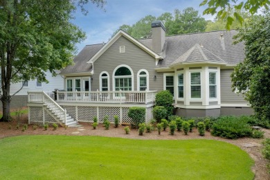 Enjoy effortless, single-level living in this thoughtfully on Great Waters Course At Reynolds Plantation in Georgia - for sale on GolfHomes.com, golf home, golf lot
