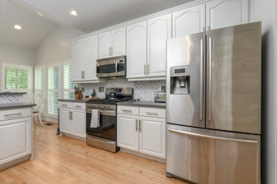 Enjoy effortless, single-level living in this thoughtfully on Great Waters Course At Reynolds Plantation in Georgia - for sale on GolfHomes.com, golf home, golf lot