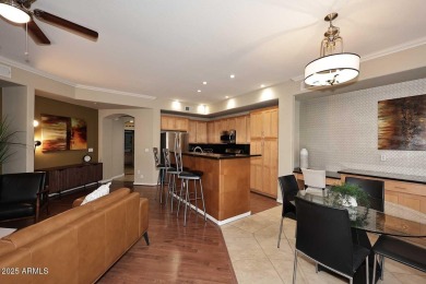 This private and spacious ground floor unit is situated directly on Scottsdale Silverado Golf Club in Arizona - for sale on GolfHomes.com, golf home, golf lot