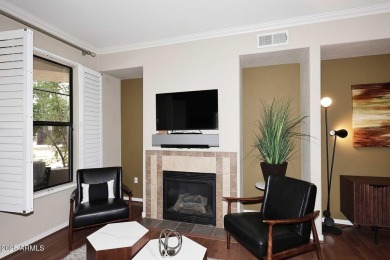 This private and spacious ground floor unit is situated directly on Scottsdale Silverado Golf Club in Arizona - for sale on GolfHomes.com, golf home, golf lot