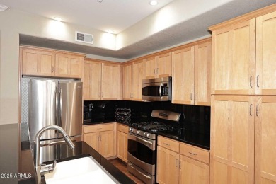 This private and spacious ground floor unit is situated directly on Scottsdale Silverado Golf Club in Arizona - for sale on GolfHomes.com, golf home, golf lot