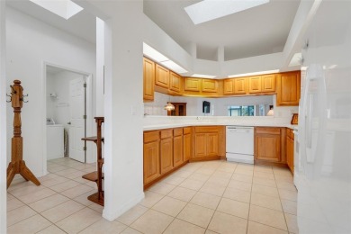 This beautifully maintained 2-bedroom, 2-bath, with den or 3rd on Monarch At Royal Highlands in Florida - for sale on GolfHomes.com, golf home, golf lot