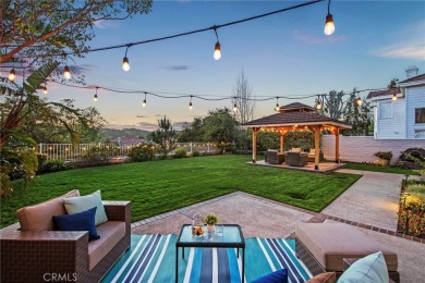 Nestled in a peaceful cul-de-sac on a single-loaded street in on Coto De Caza Golf Club in California - for sale on GolfHomes.com, golf home, golf lot