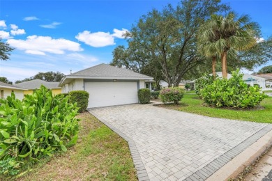 This beautifully maintained 2-bedroom, 2-bath, with den or 3rd on Monarch At Royal Highlands in Florida - for sale on GolfHomes.com, golf home, golf lot