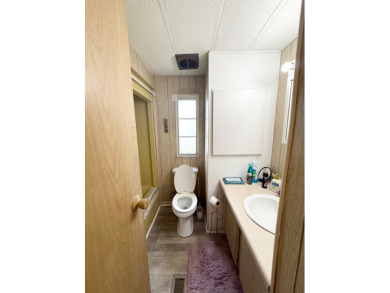 DONT MISS OUT ON THIS VERY CLEAN & WELL-MAINTAINED home is on Lone Palm Golf Club in Florida - for sale on GolfHomes.com, golf home, golf lot