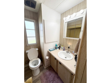 DONT MISS OUT ON THIS VERY CLEAN & WELL-MAINTAINED home is on Lone Palm Golf Club in Florida - for sale on GolfHomes.com, golf home, golf lot