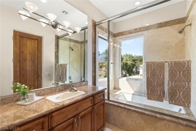 Experience luxury living in this palatial estate with over an on Southern Highlands Golf Club in Nevada - for sale on GolfHomes.com, golf home, golf lot