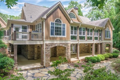 This stunning 4-bedroom, 4-bath home offers a refined living on Reynolds Lake Oconee - The Oconee in Georgia - for sale on GolfHomes.com, golf home, golf lot