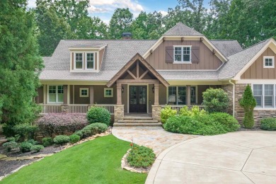 This stunning 4-bedroom, 4-bath home offers a refined living on Reynolds Lake Oconee - The Oconee in Georgia - for sale on GolfHomes.com, golf home, golf lot