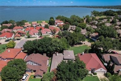 Welcome to this stunning 4-bedroom, 2.5-bathroom residence on Lakeside Village Golf Course in Texas - for sale on GolfHomes.com, golf home, golf lot