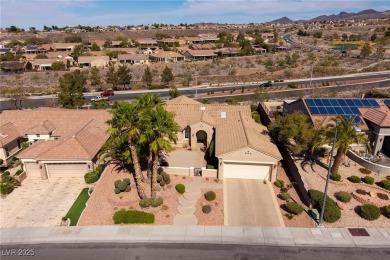 Lovely mountain views in Sun City Anthem! A charming gated front on Revere Golf Club in Nevada - for sale on GolfHomes.com, golf home, golf lot