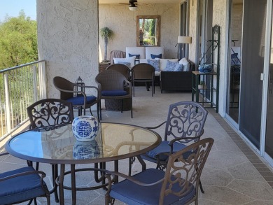 This exceptional corner unit offers stunning south and on Desert Island Golf and Country Club in California - for sale on GolfHomes.com, golf home, golf lot