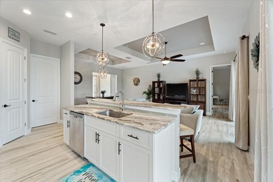 Welcome to your dream home on a freshwater canal in the highly on Pinemoor West Golf Club in Florida - for sale on GolfHomes.com, golf home, golf lot