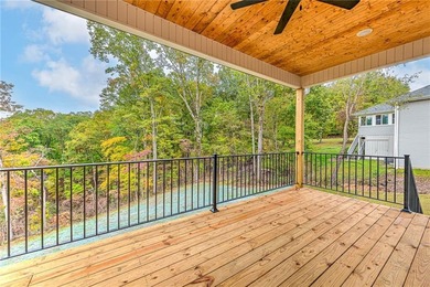 Discover elevated living in this meticulously maintained on Bella Vista - Metfield Golf Complex and Country Club in Arkansas - for sale on GolfHomes.com, golf home, golf lot
