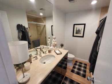 This exceptional corner unit offers stunning south and on Desert Island Golf and Country Club in California - for sale on GolfHomes.com, golf home, golf lot