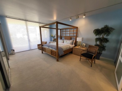 This exceptional corner unit offers stunning south and on Desert Island Golf and Country Club in California - for sale on GolfHomes.com, golf home, golf lot
