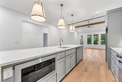 Discover elevated living in this meticulously maintained on Bella Vista - Metfield Golf Complex and Country Club in Arkansas - for sale on GolfHomes.com, golf home, golf lot