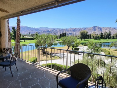 This exceptional corner unit offers stunning south and on Desert Island Golf and Country Club in California - for sale on GolfHomes.com, golf home, golf lot