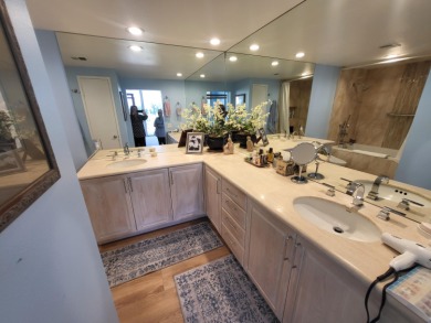 This exceptional corner unit offers stunning south and on Desert Island Golf and Country Club in California - for sale on GolfHomes.com, golf home, golf lot