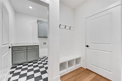 Discover elevated living in this meticulously maintained on Bella Vista - Metfield Golf Complex and Country Club in Arkansas - for sale on GolfHomes.com, golf home, golf lot