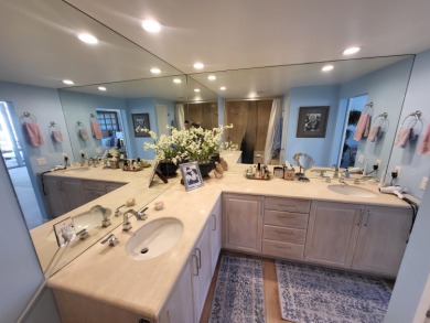 This exceptional corner unit offers stunning south and on Desert Island Golf and Country Club in California - for sale on GolfHomes.com, golf home, golf lot