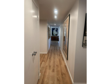 This exceptional corner unit offers stunning south and on Desert Island Golf and Country Club in California - for sale on GolfHomes.com, golf home, golf lot
