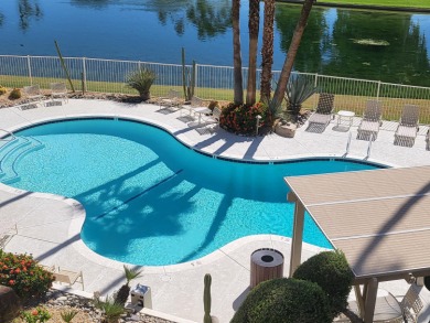 This exceptional corner unit offers stunning south and on Desert Island Golf and Country Club in California - for sale on GolfHomes.com, golf home, golf lot